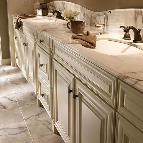 Large bathroom vanity top featuring a white marble style.
