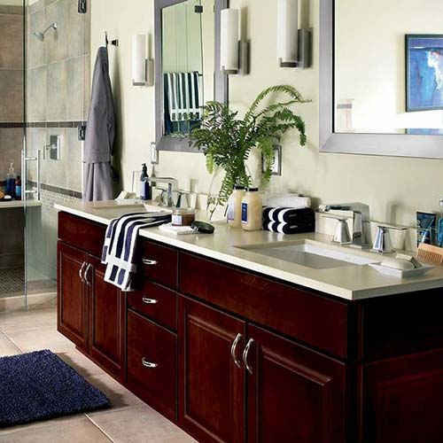 This bathroom remodel features a modern cut countertop showcasing fine lines an straight edges.